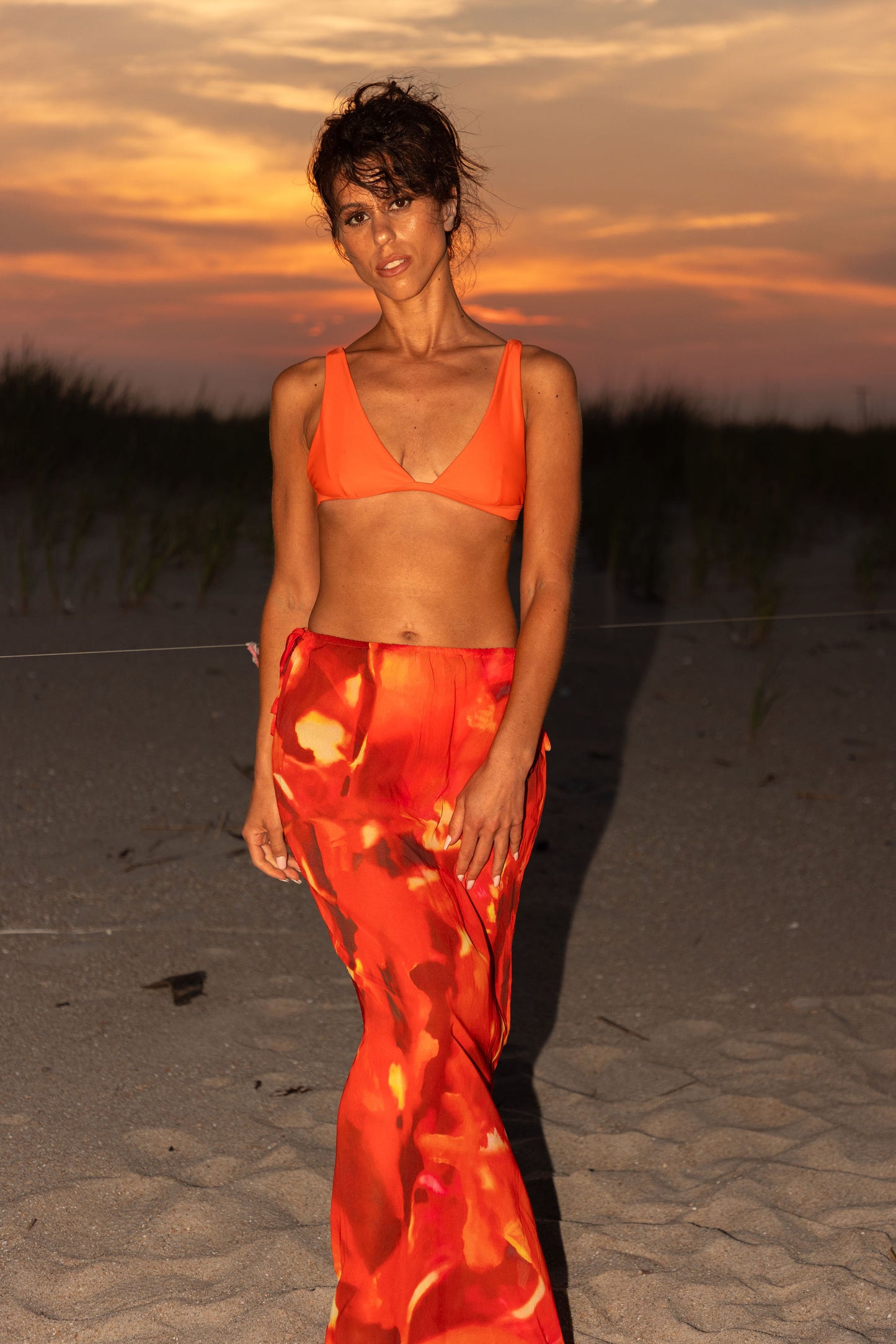 Orange yellow red multi color skirt cover-up with adjustable draw strings. Relaxed fit