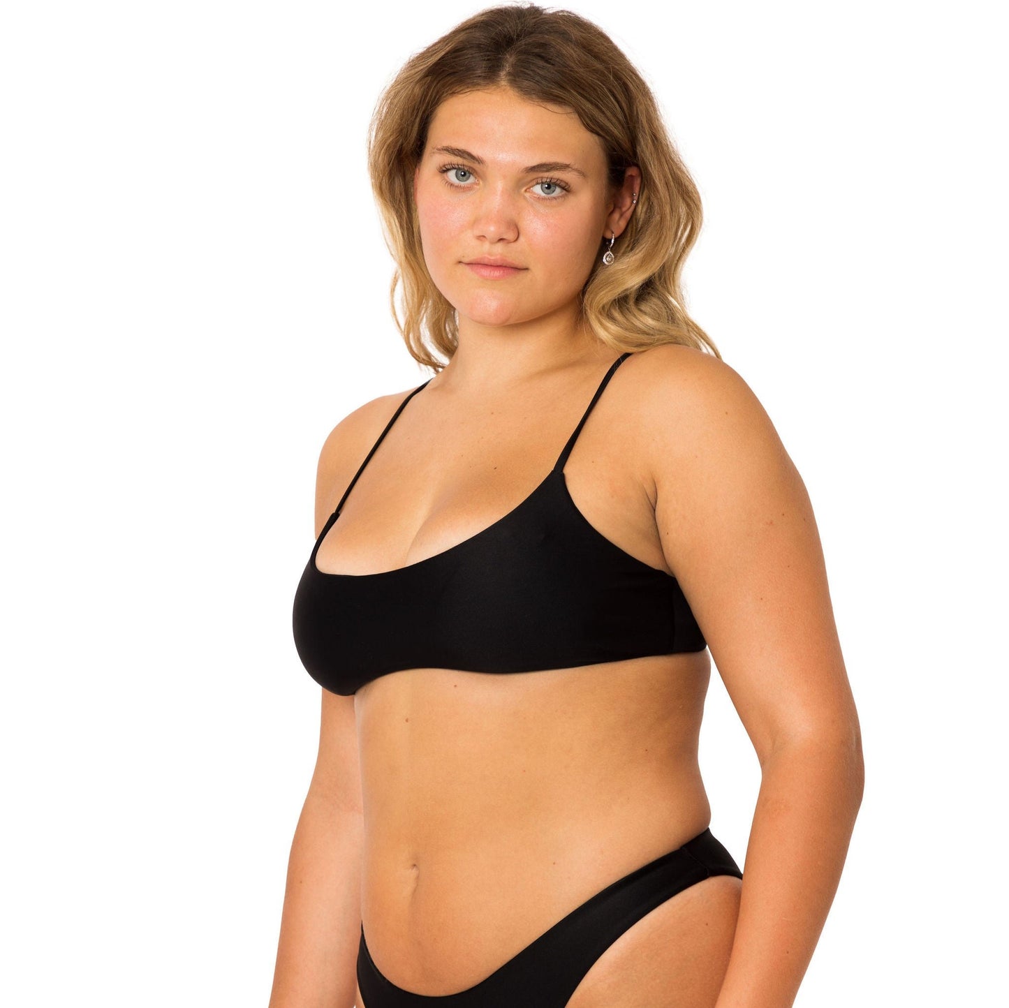 Black low scoop bralette top with seamless feature. Buttery soft and double lined.