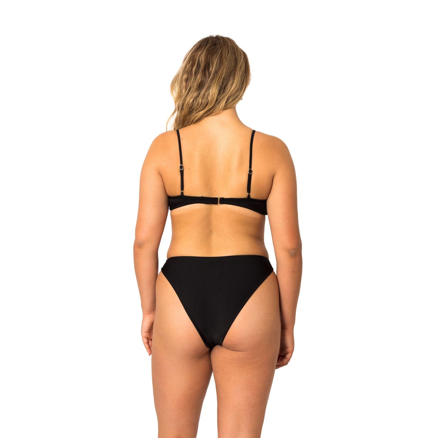 Timeless & Seamless low scoop bathing suit bikini top with adjustable shoulder Straps and gold sliders. Adjustable back with a 3-hook option. in black side profile.