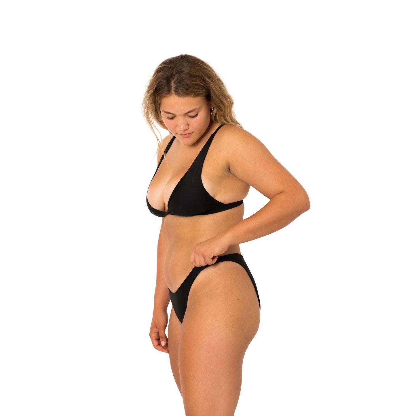 Seamless full coverage bathing suit bottom in black side